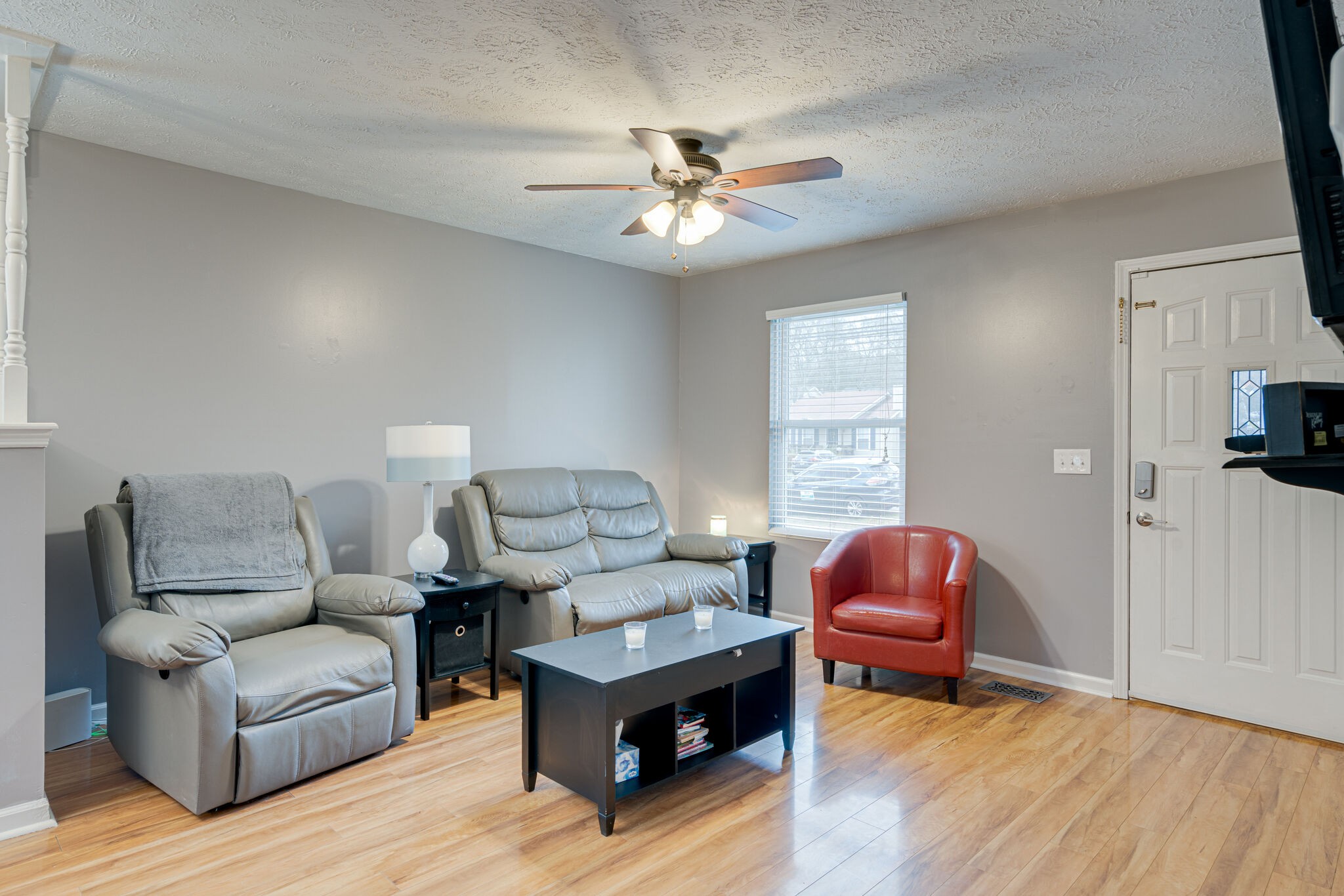 1453 Ocoee Trail Madison, TN 37115 - Photo 8 of 25 a living room with furniture and a wooden floor