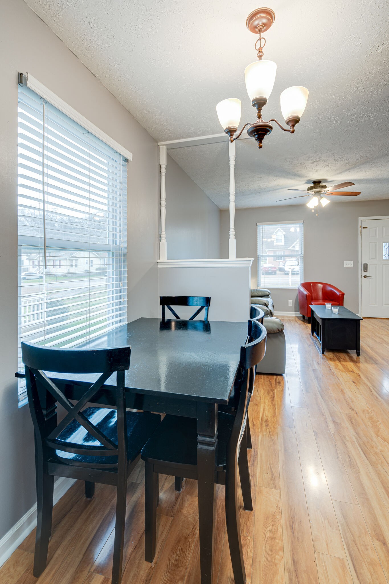 1453 Ocoee Trail Madison, TN 37115 - Photo 10 of 25 a view of a dining room with furniture and wooden floor