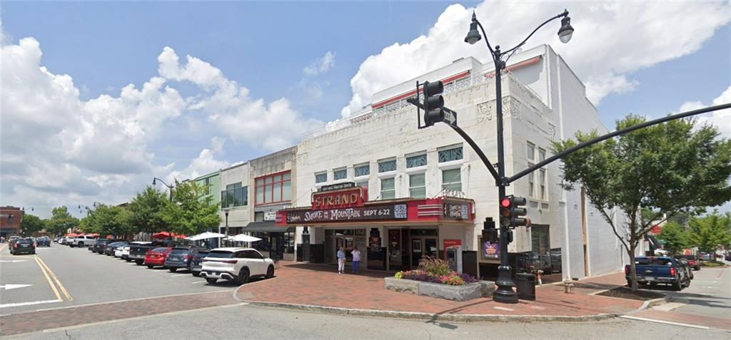 3701 Shallowford Road Marietta, GA 30062 - Photo 47 of 49 a car parked in front of a building