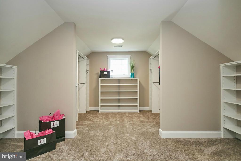 1871 Beulah Road Vienna, VA 22182 - Photo 13 of 30 a view of a room with a furniture and closet