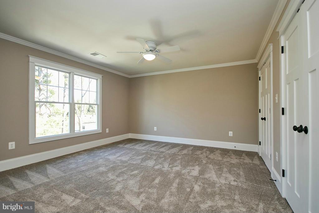 1871 Beulah Road Vienna, VA 22182 - Photo 17 of 30 a view of an empty room with a window