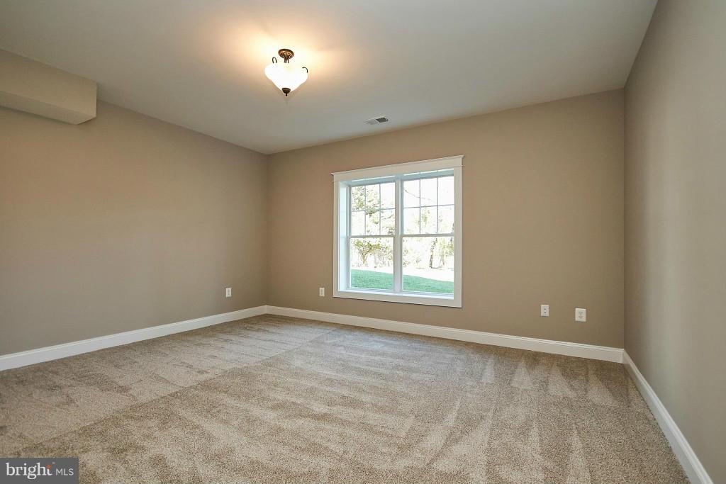 1871 Beulah Road Vienna, VA 22182 - Photo 24 of 30 an empty room with a window