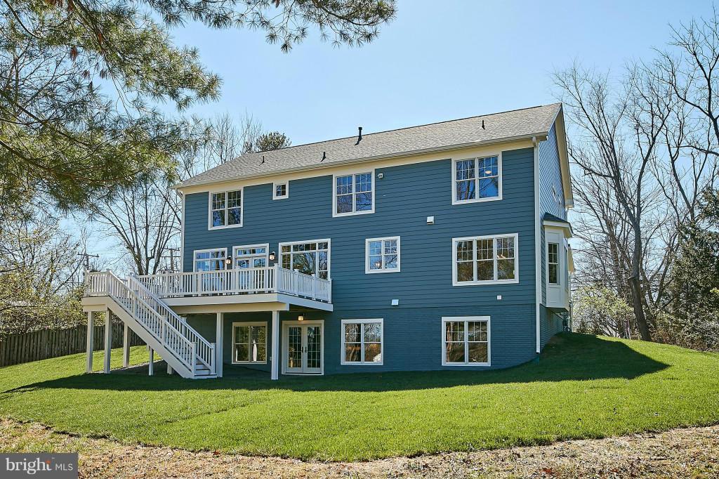 1871 Beulah Road Vienna, VA 22182 - Photo 29 of 30 a front view of a house with a yard