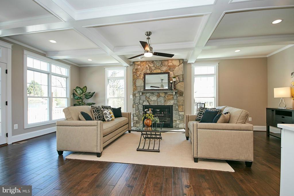 1871 Beulah Road Vienna, VA 22182 - Photo 10 of 30 a living room with fireplace furniture and a wooden floor