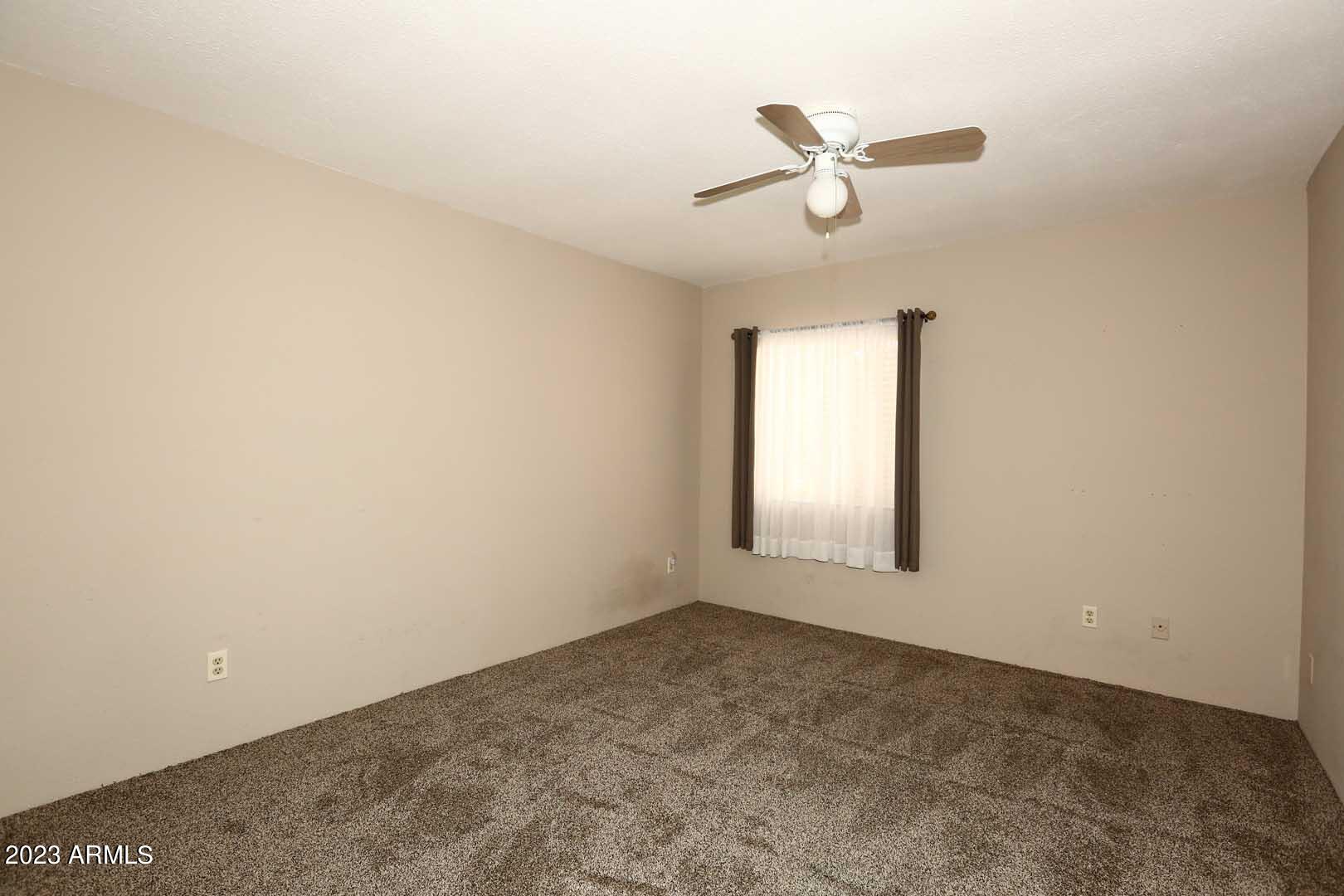 4554 East Paradise Village Parkway North, Unit 259 Phoenix, AZ 85032 - Photo 13 of 30 an empty room