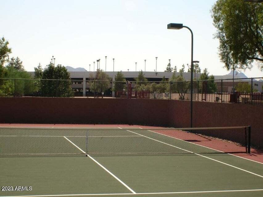 4554 East Paradise Village Parkway North, Unit 259 Phoenix, AZ 85032 - Photo 29 of 30 a view of a tennis court