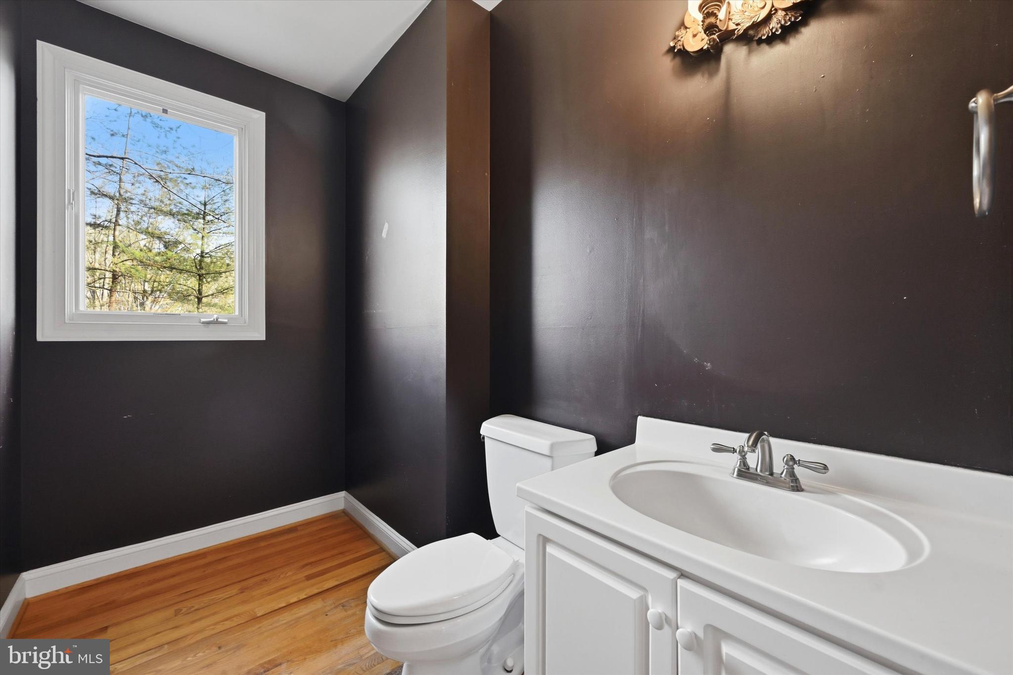 2 Timber Mill Lane Landenberg, PA 19350 - Photo 16 of 32 a bathroom with a sink a toilet and a mirror