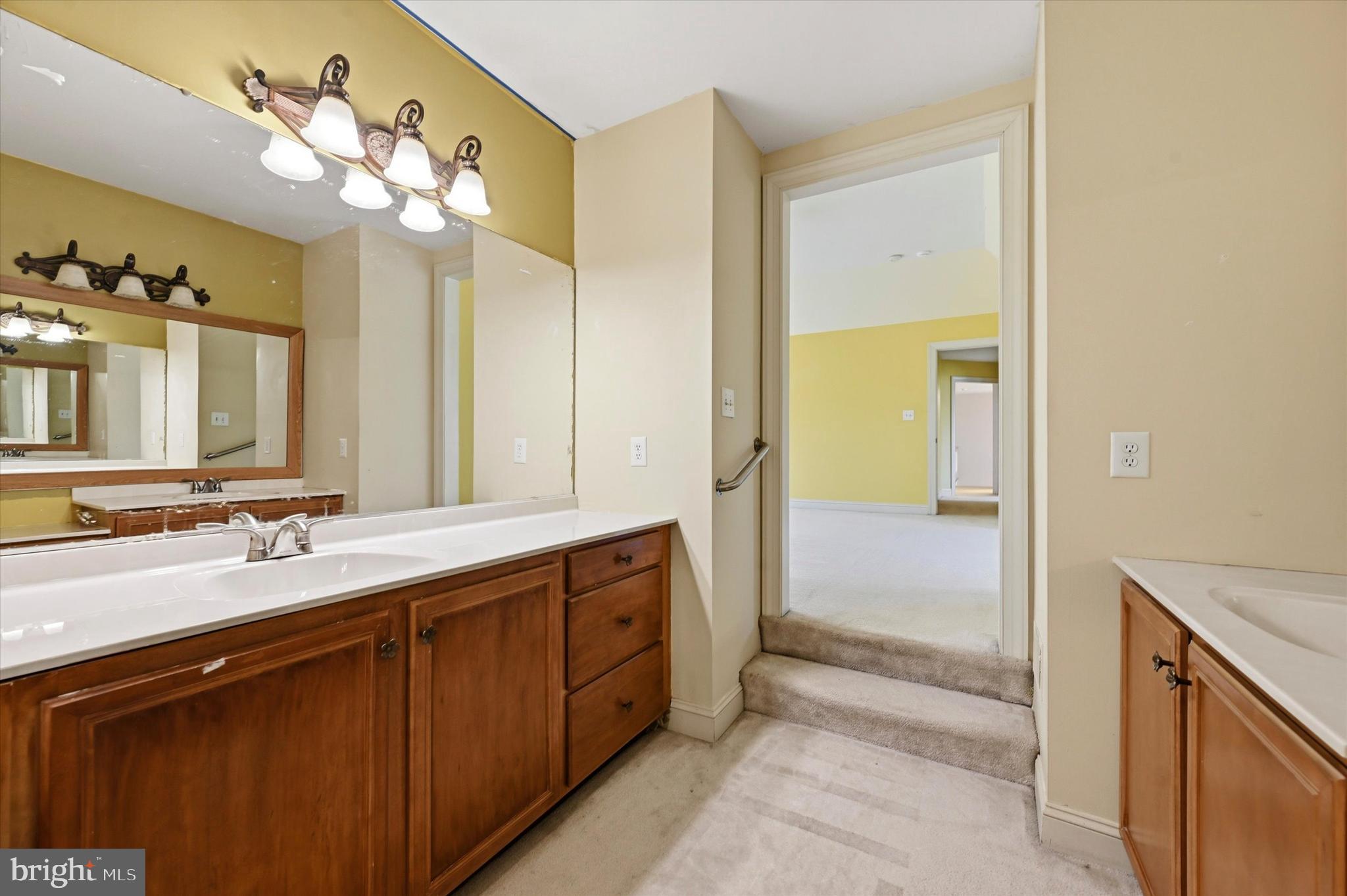 2 Timber Mill Lane Landenberg, PA 19350 - Photo 24 of 32 a bathroom with a double vanity sink and a mirror