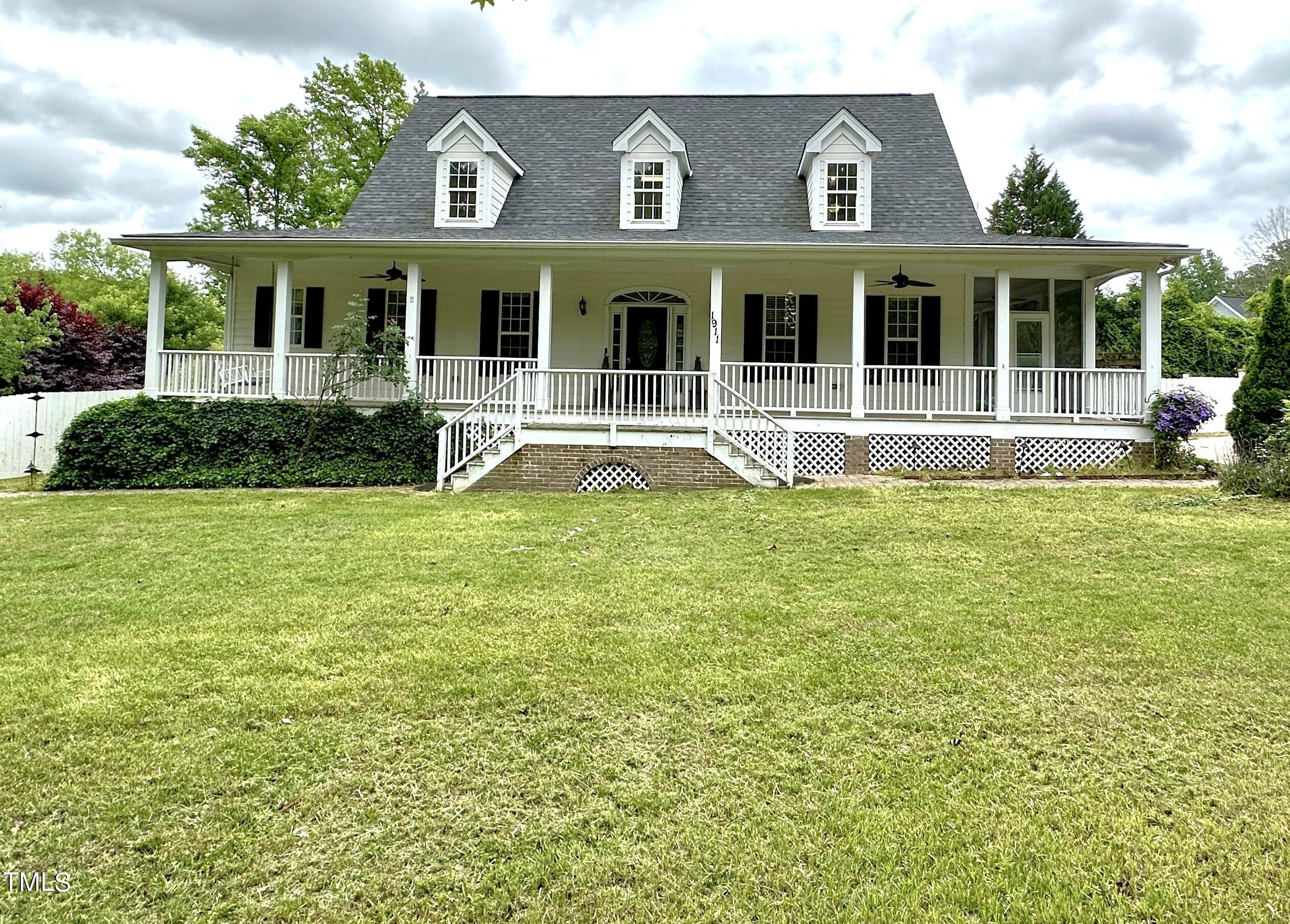 a view of a house with a swimming pool