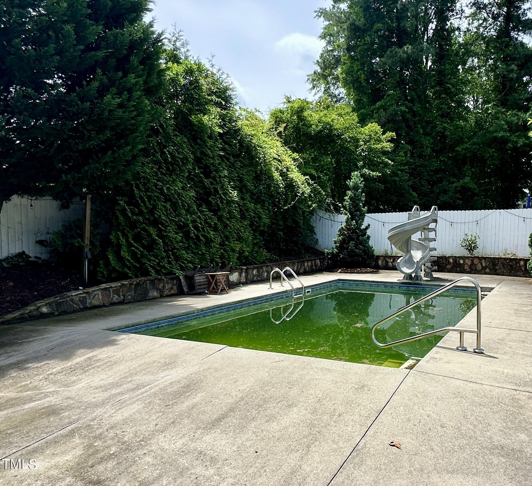 1911 South Mineral Springs Road Durham, NC 27703 - Photo 21 of 31 a view of swimming pool with lounge chair
