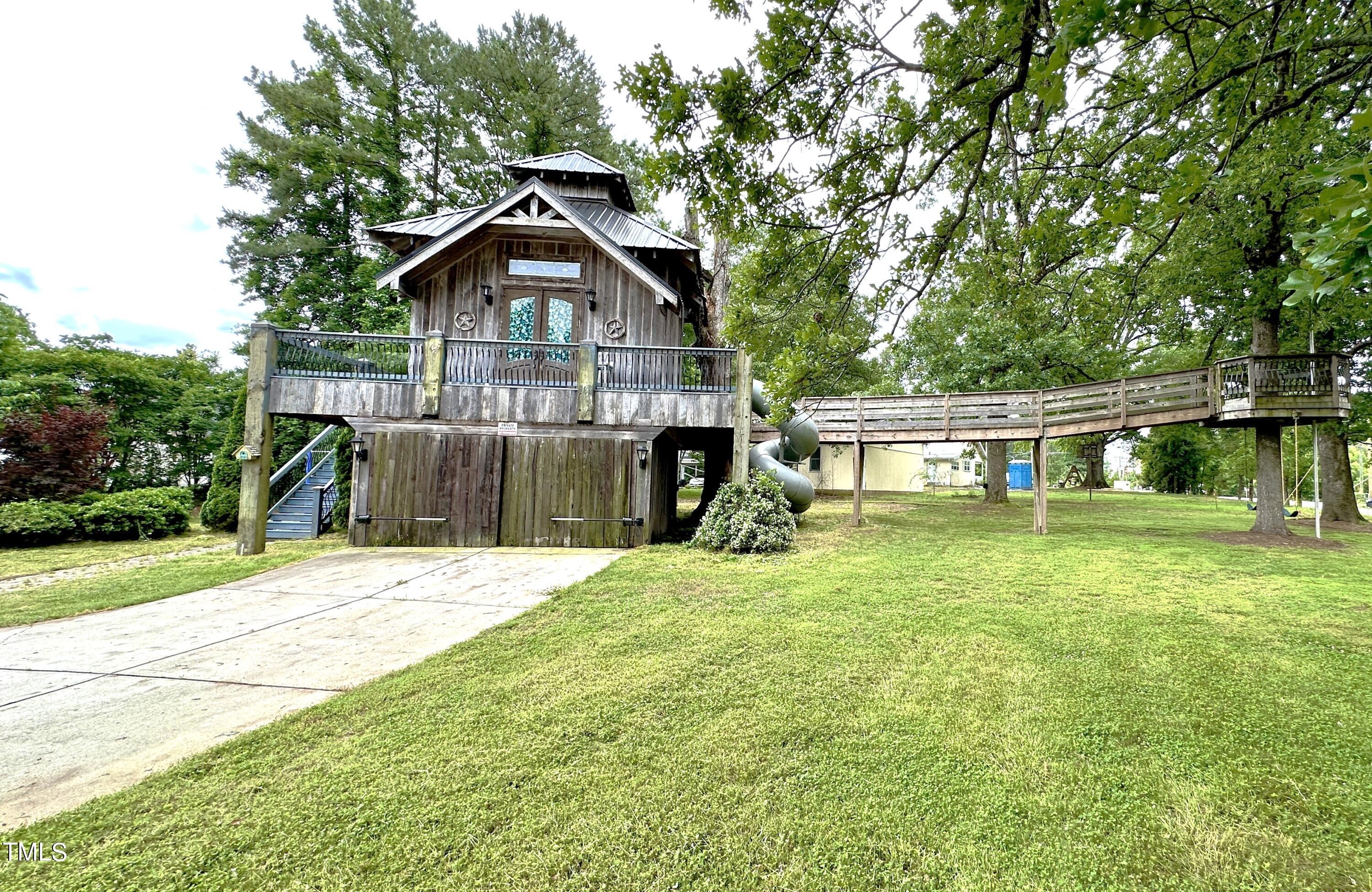 1911 South Mineral Springs Road Durham, NC 27703 - Photo 24 of 31 a front view of a house with a yard