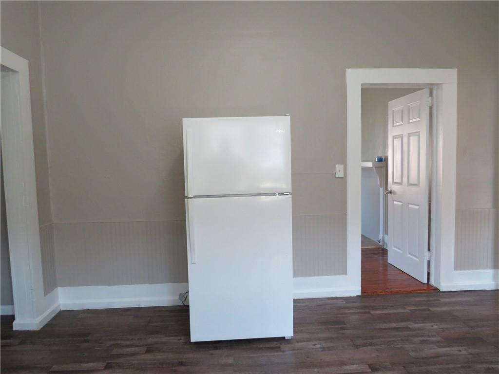 293 4th Street Cedartown, GA 30125 - Photo 15 of 15 a view of empty room with wooden floor