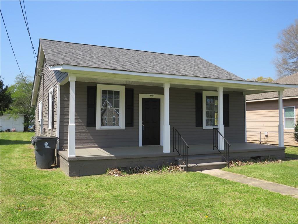 293 4th Street Cedartown, GA 30125 - Photo 2 of 15 a front view of a house with yard