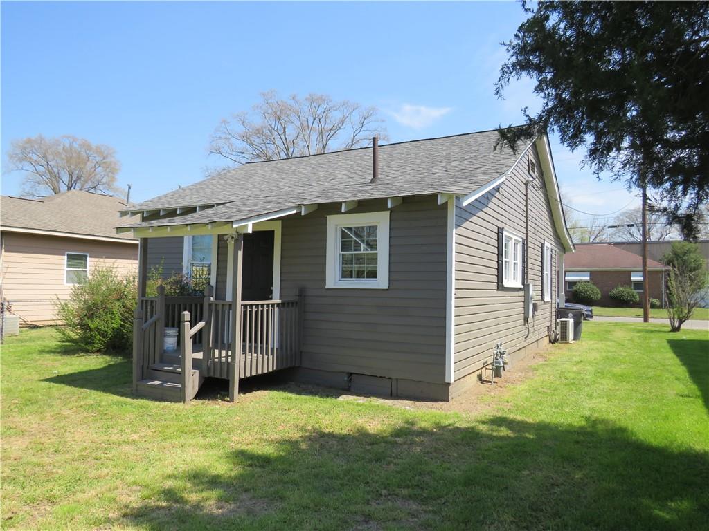 293 4th Street Cedartown, GA 30125 - Photo 3 of 15 a view of a house with a yard