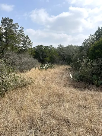 a view of mountain with lake view