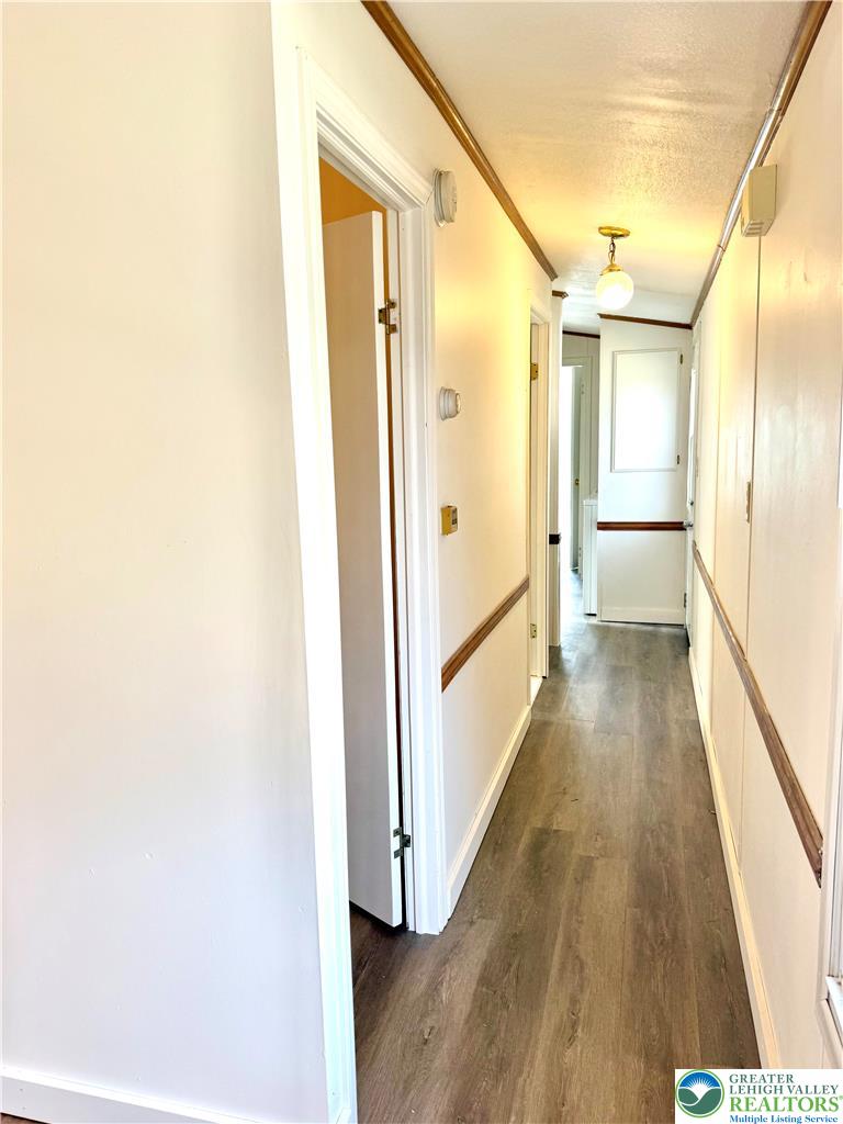 204 Molly Pitcher Road Mount Bethel, PA 18343 - Photo 15 of 34 a view of gallery with wooden floor