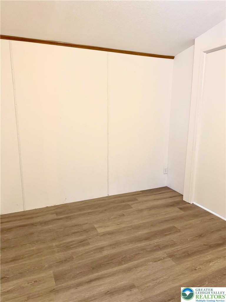 204 Molly Pitcher Road Mount Bethel, PA 18343 - Photo 16 of 34 a view of a small space with wooden floor