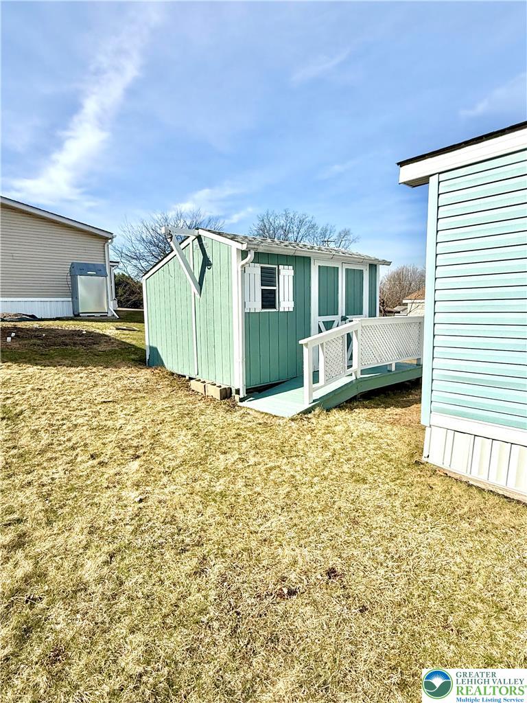204 Molly Pitcher Road Mount Bethel, PA 18343 - Photo 28 of 34 a house view with a backyard space