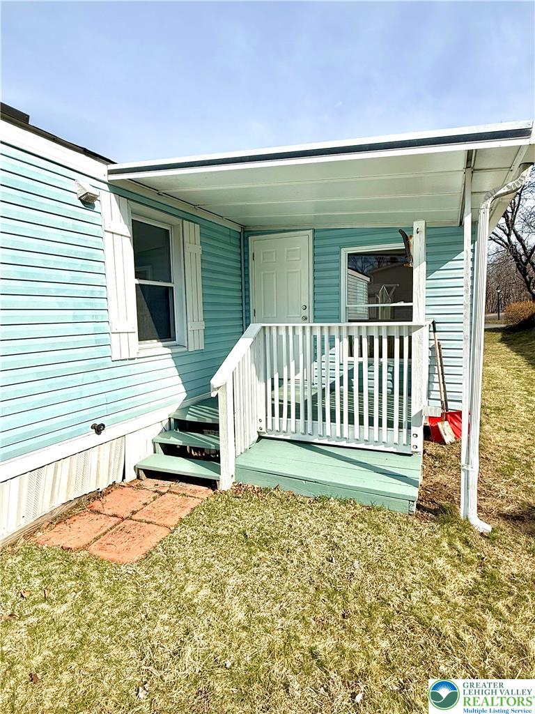 204 Molly Pitcher Road Mount Bethel, PA 18343 - Photo 29 of 34 a view of a chair and table in the patio