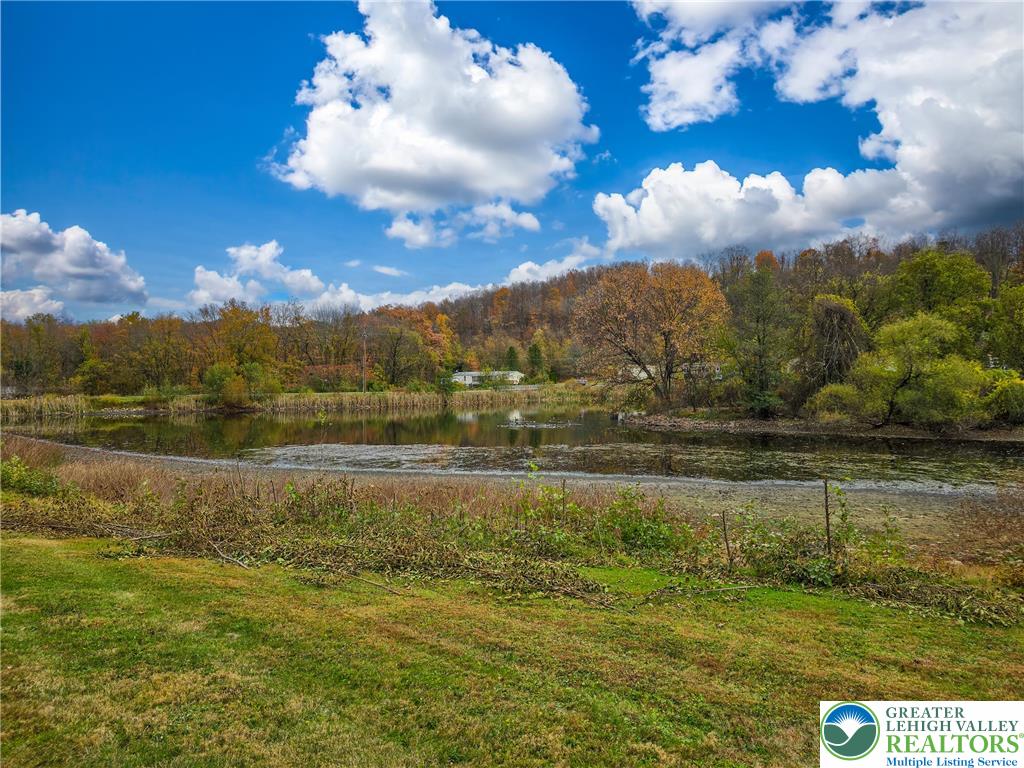 204 Molly Pitcher Road Mount Bethel, PA 18343 - Photo 34 of 34 a view of a lake with a big yard