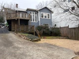 566 Rankin Street Northeast, Unit B Atlanta, GA 30308 - Photo 1 of 5 a front view of a house with a yard and garage