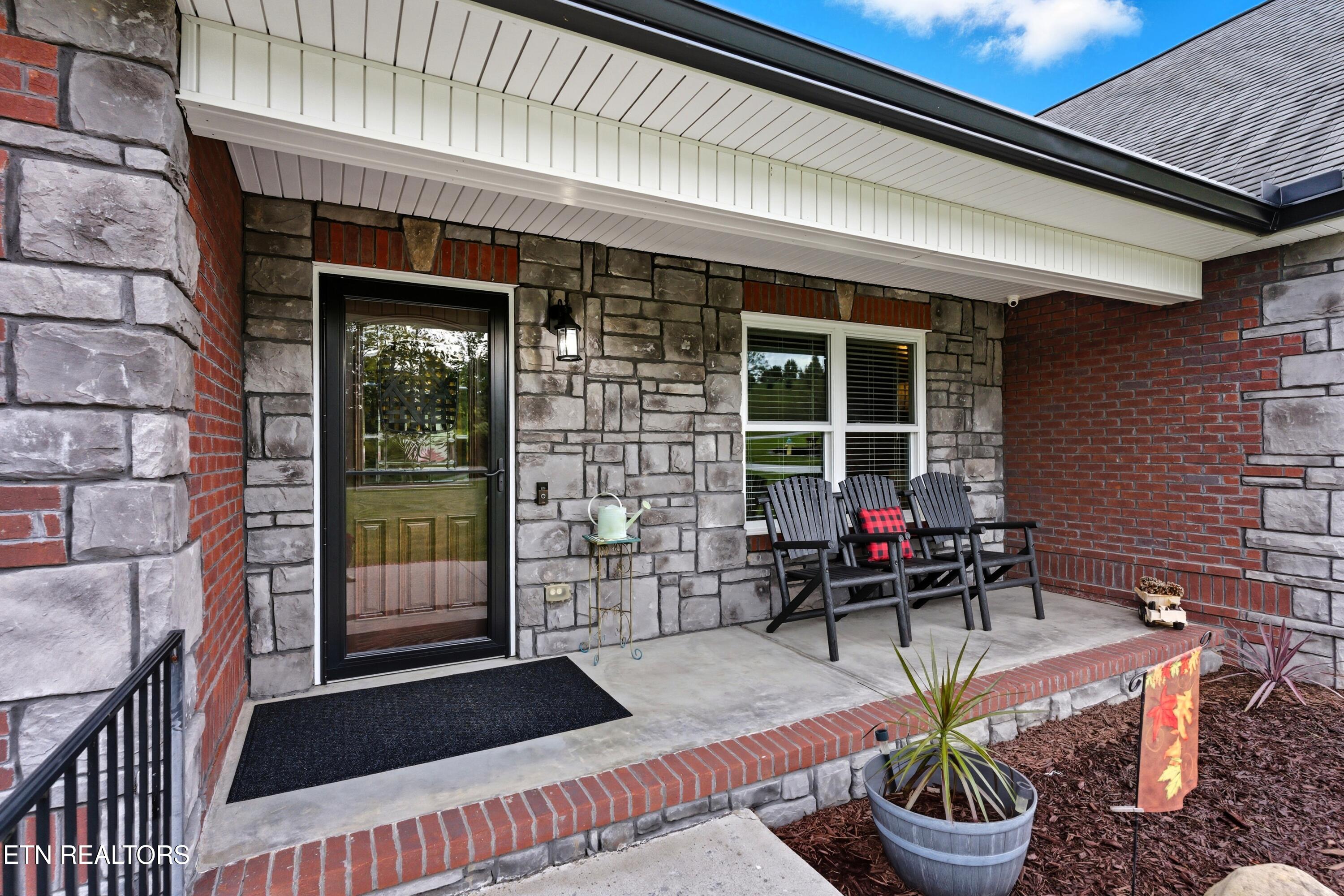 8261 Greenwell Road Knoxville, TN 37938 - Photo 3 of 55 front outside porch