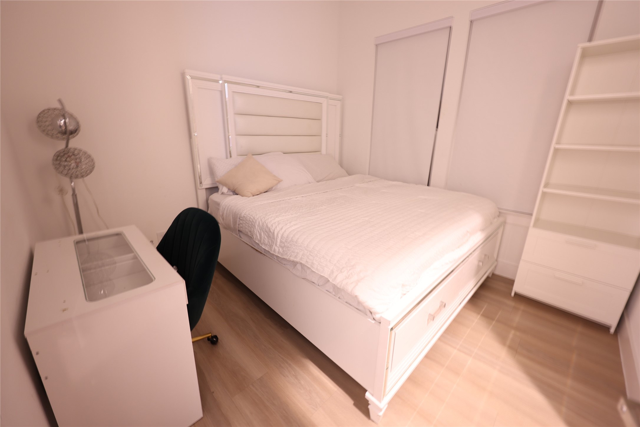 3549 Amos Street Houston, TX 77021 - Photo 13 of 19 a bedroom with a bed and a dresser