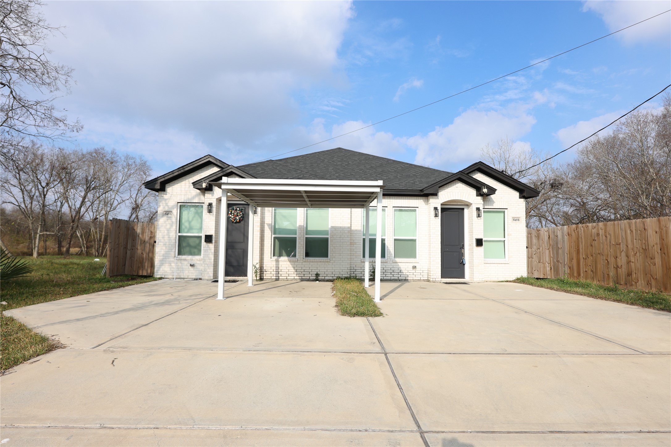 3549 Amos Street Houston, TX 77021 - Photo 2 of 19 a house with yard outdoor seating and barbeque oven