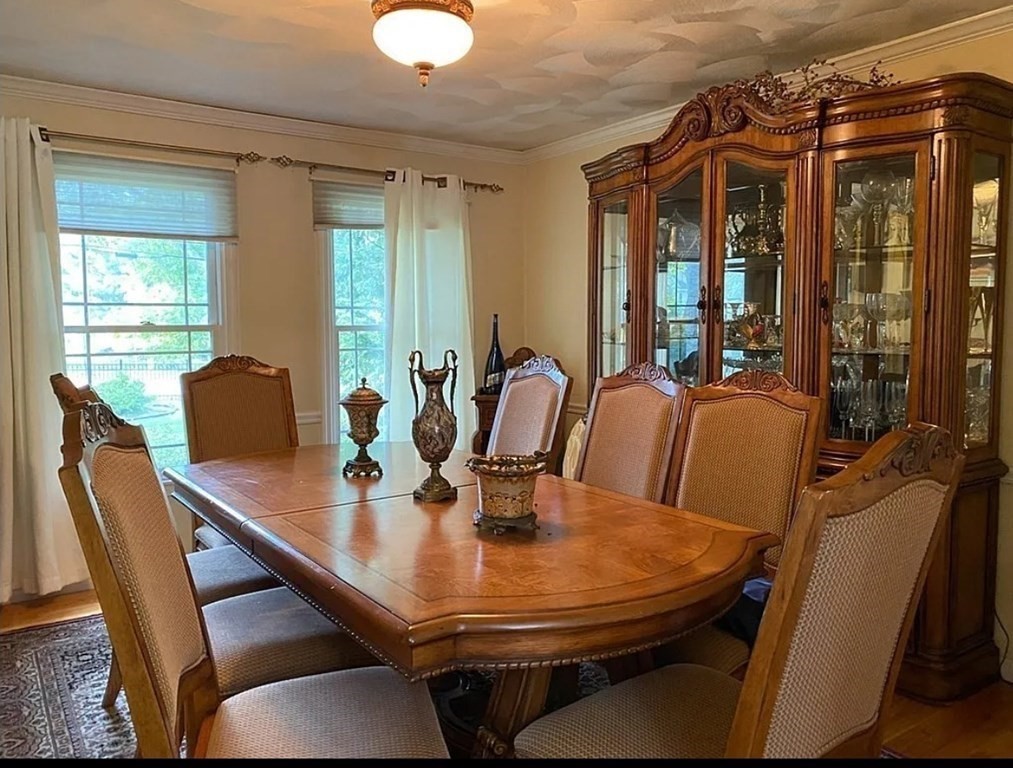 338 River Road Andover, MA 01810 - Photo 2 of 28 a dining room with furniture and window