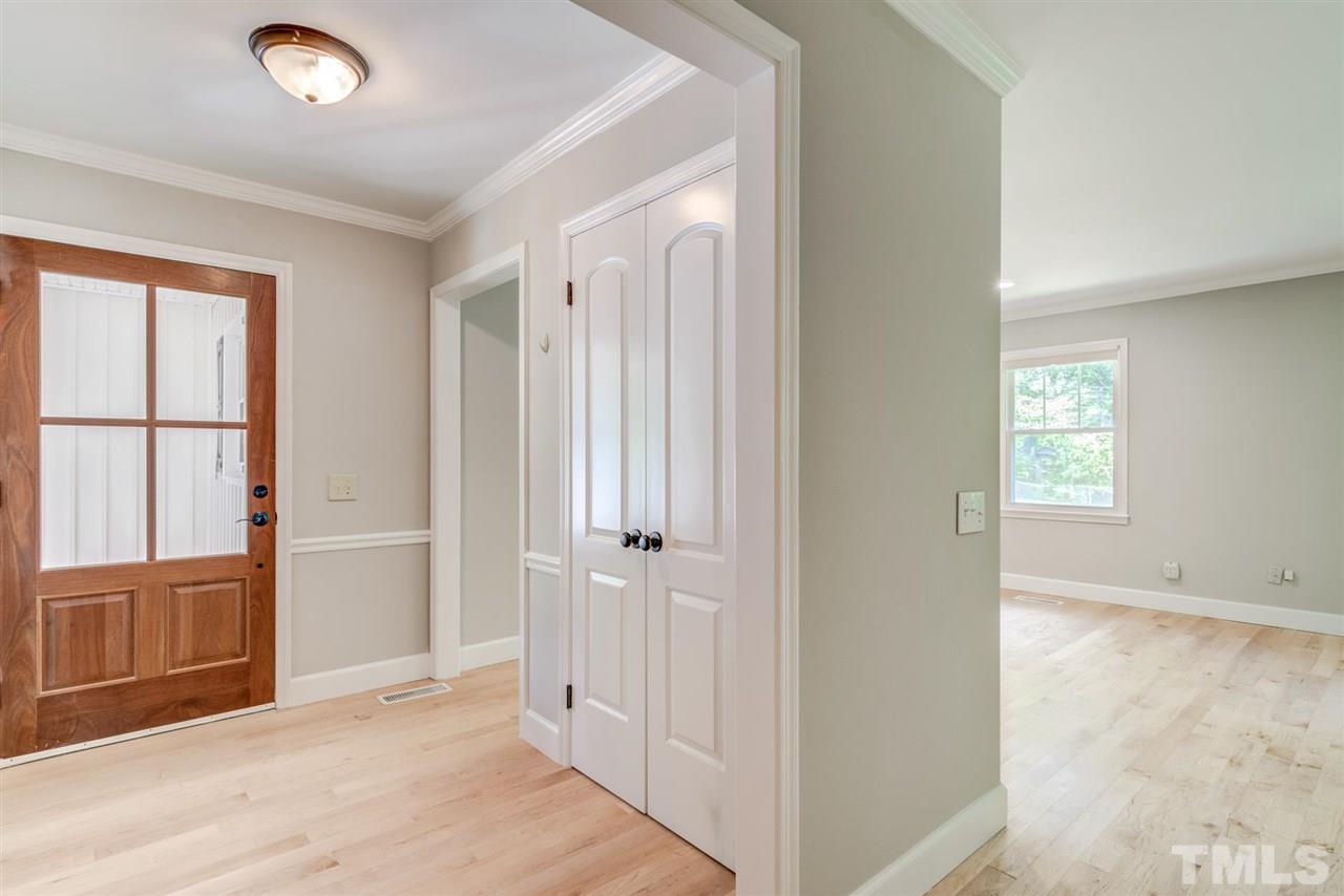 5907 Newhall Road Durham, NC 27713 - Photo 5 of 29 an empty room with windows