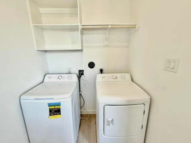 a utility room with dryer and washer