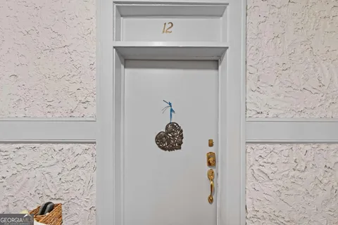 a bathroom with a shower and a window