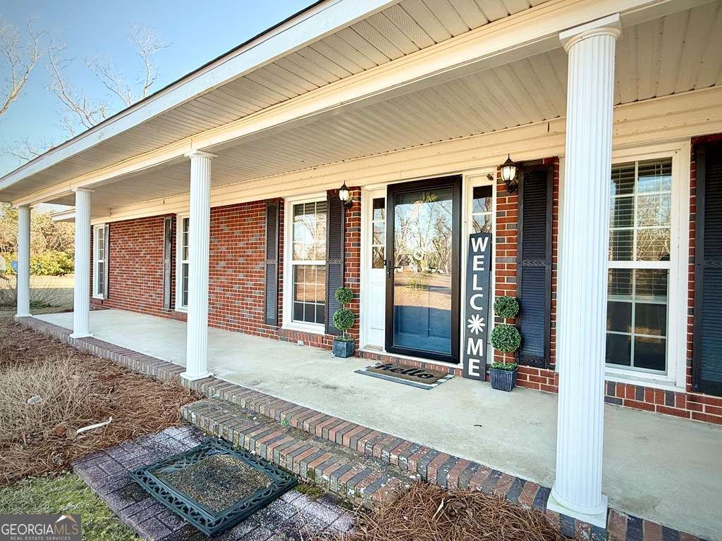 201 Burketts Ferry Road Hazlehurst, GA 31539 - Photo 12 of 52 a view of a entryway door front of house