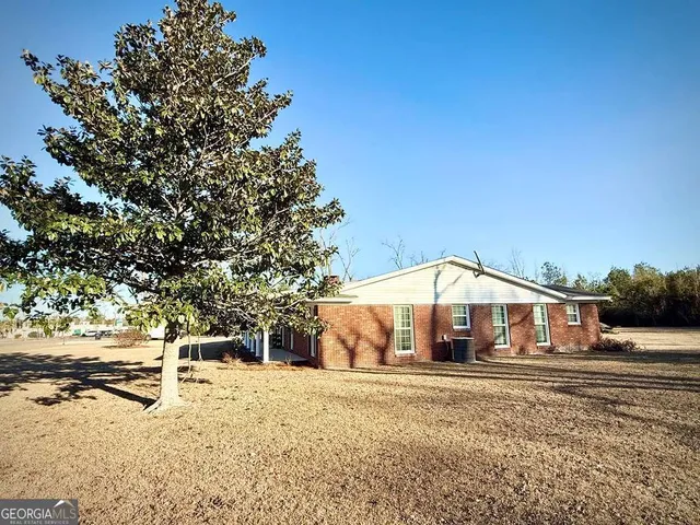 a house view with a garden space