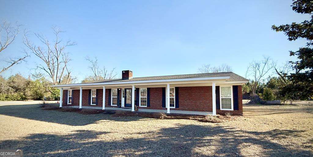 201 Burketts Ferry Road Hazlehurst, GA 31539 - Photo 2 of 52 a view of a house with a yard