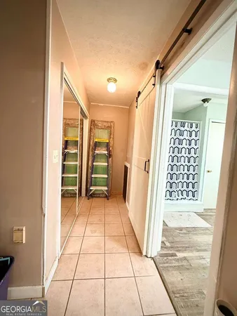 a room with furniture and flat screen tv