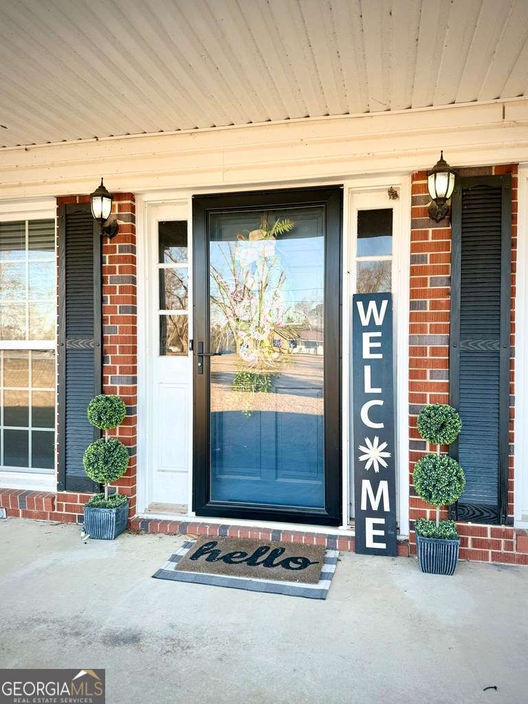 201 Burketts Ferry Road Hazlehurst, GA 31539 - Photo 9 of 52 a view of entrance front of the house