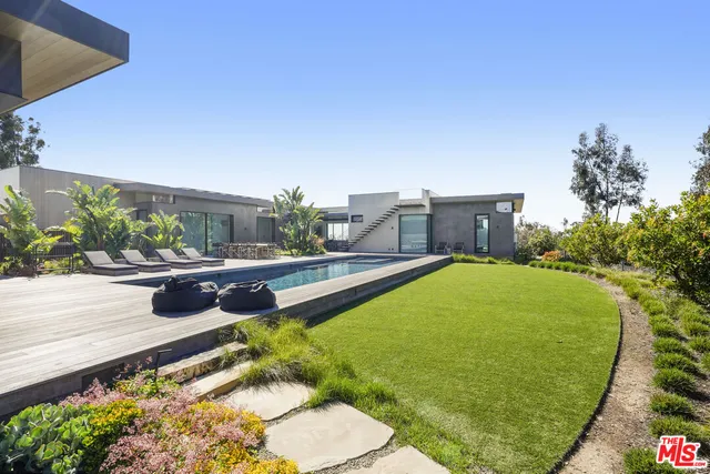 a view of bathroom with a tub and sink