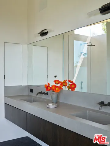 a swimming pool with outdoor seating and yard