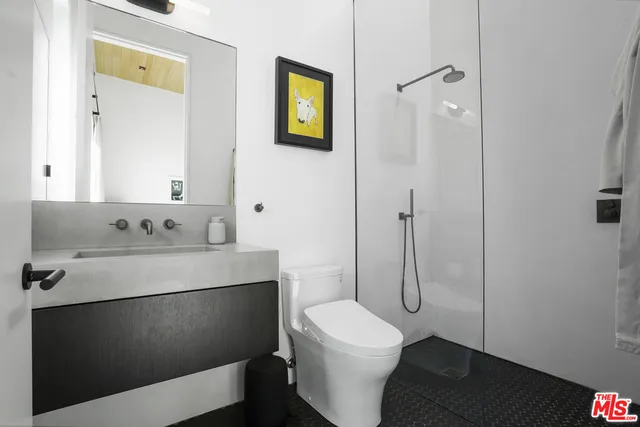 an aerial view of a house with a ocean view