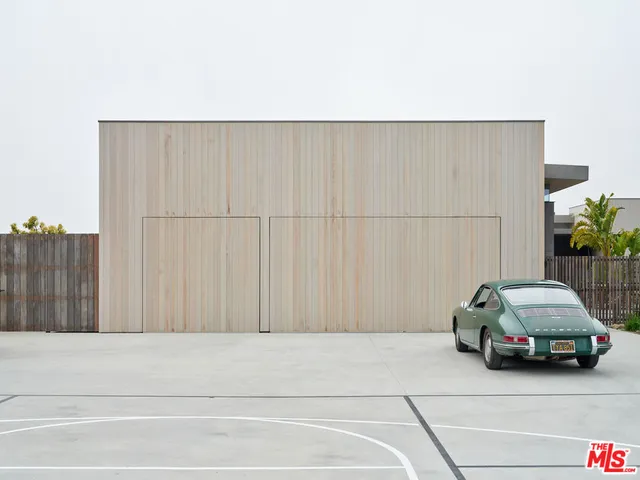a bathroom with a shower and a sink