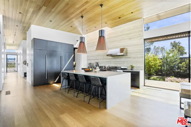 a view of living room with furniture and window