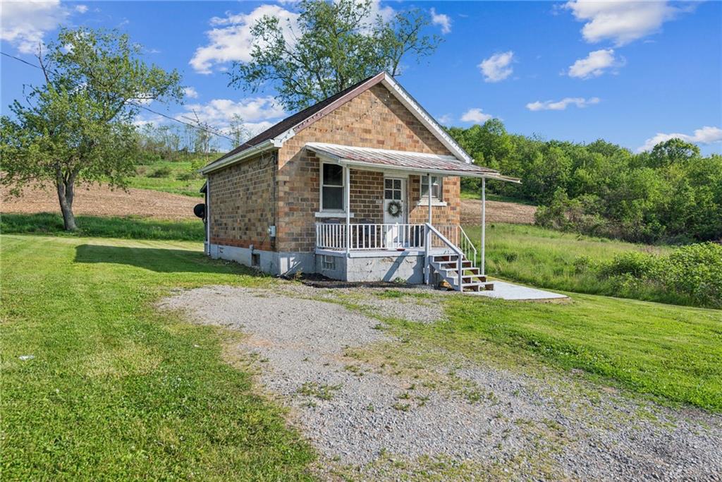 375 Reduction Road Smithton, PA 15479 - Photo 20 of 30 a view of a house with backyard