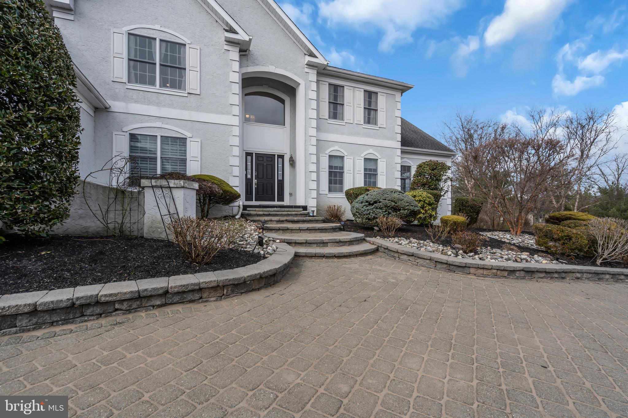 317 Christopher Drive Princeton, NJ 08540 - Photo 2 of 66 a front view of a house with a yard