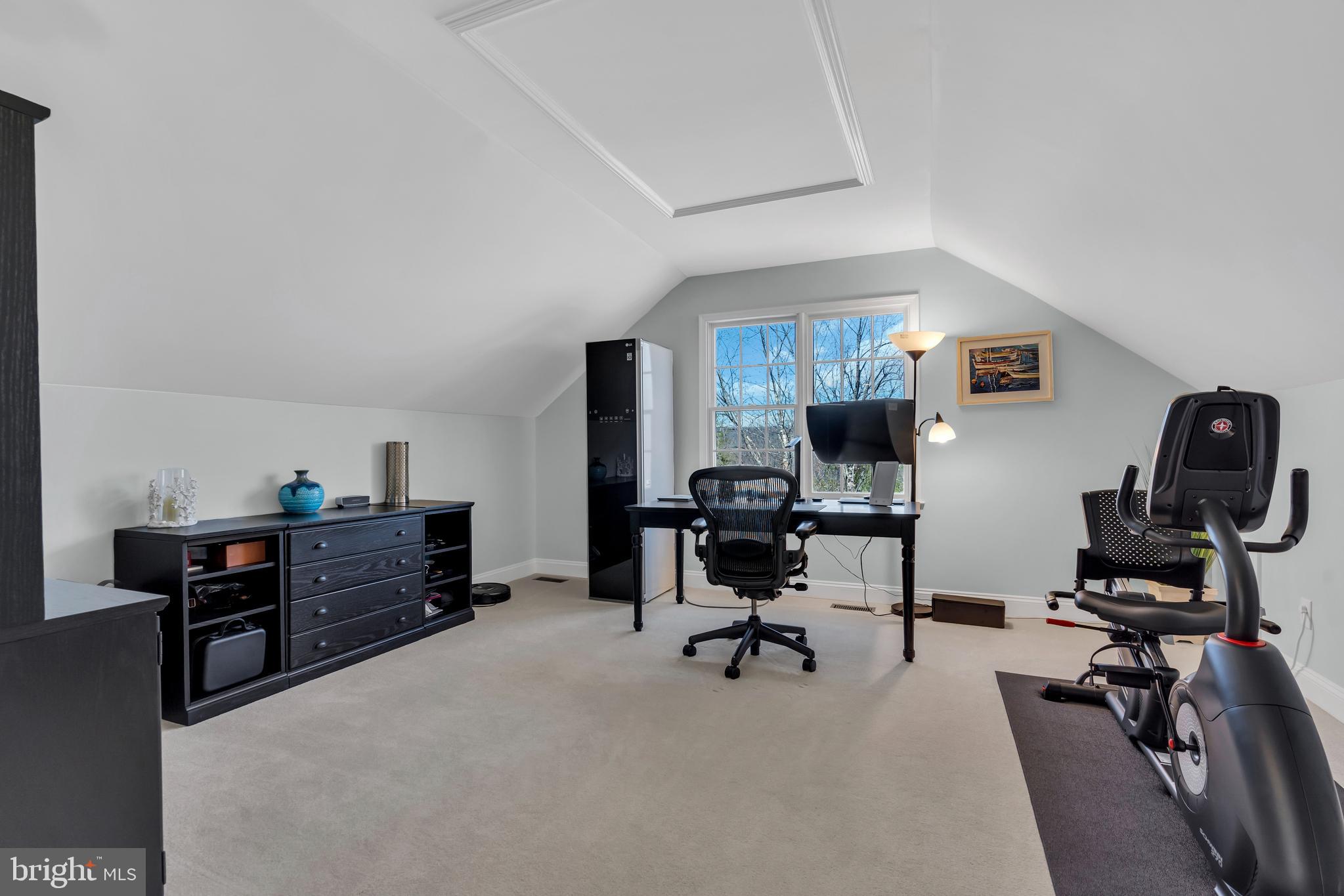 317 Christopher Drive Princeton, NJ 08540 - Photo 37 of 66 a view of a workspace with furniture and a bedroom