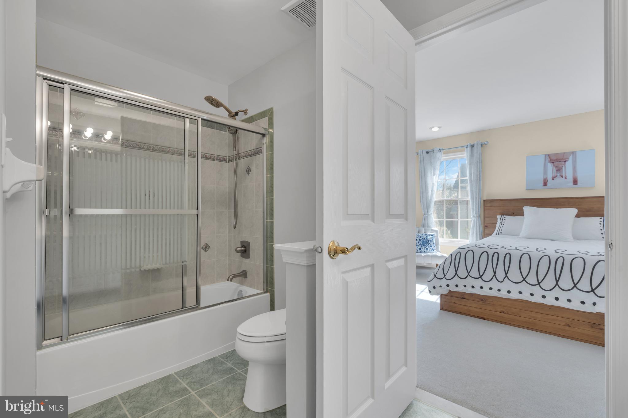 317 Christopher Drive Princeton, NJ 08540 - Photo 45 of 66 a spacious bathroom with a shower and a toilet