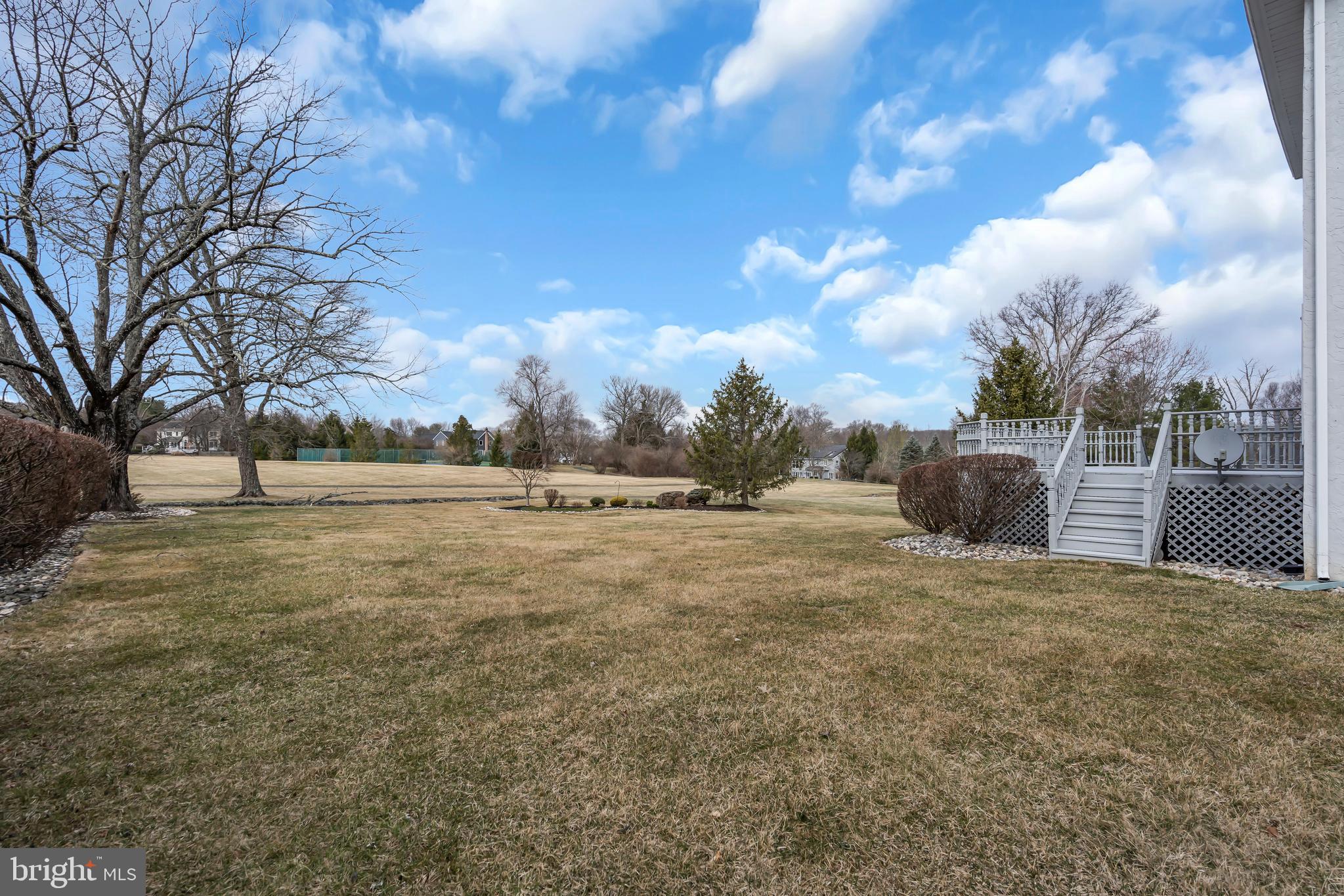 317 Christopher Drive Princeton, NJ 08540 - Photo 56 of 66 a view of a field with trees in the background