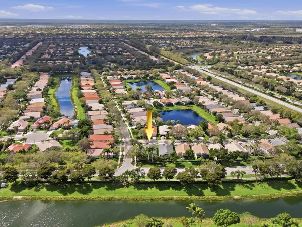 a view of sign board with flower around