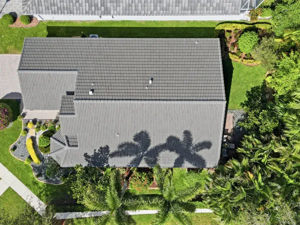 an aerial view of lake residential houses with outdoor space and swimming pool