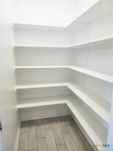 a view of a room with shelves